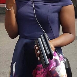 Elegant Navy Off-Shoulder Dress with Floral Detail